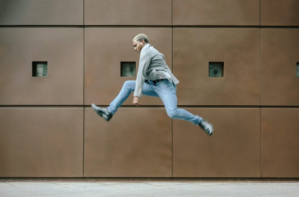 Businessman jumping for joy